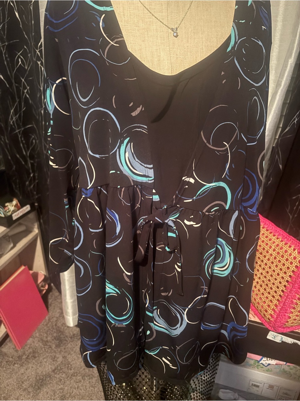 Women’s Black Tie-Front Printed Tunic with cami attached.